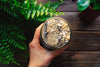 Nutrient-rich protein & collagen smoothie with coconut and nut toppings
